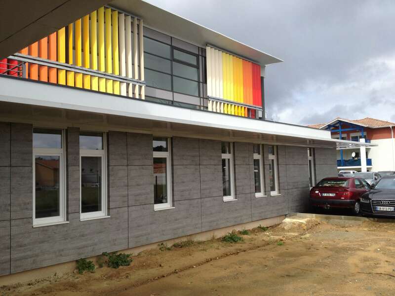 ITE des murs en laine de verre et bardage Trespa